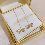 Golden Bow hanging Earrings