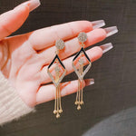 Black Gold Dangle Earrings