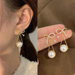 golden Bow Hangings Earrings